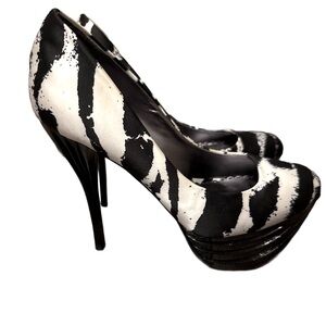Bebe Zebra Platform Stiletto Heels 
Sz 7
NWT’s